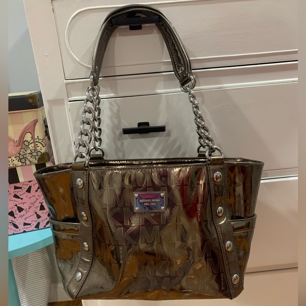 Michael Kors metallic bag with chain detail on the straps.